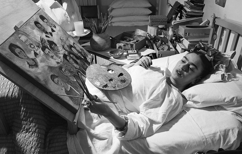 Photo of Frida Working on Her Bed