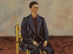 Self portrait with Cropped Hair by Frida Kahlo